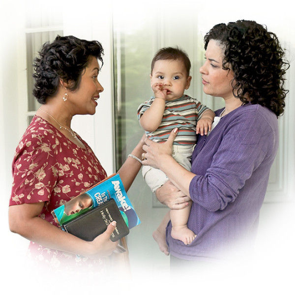 A sister witnesses to a mother who is holding a baby