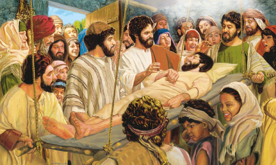 Sarong paralisadong lalaki na nasa tiheras na ibinaba ki Jesus hali sa atop