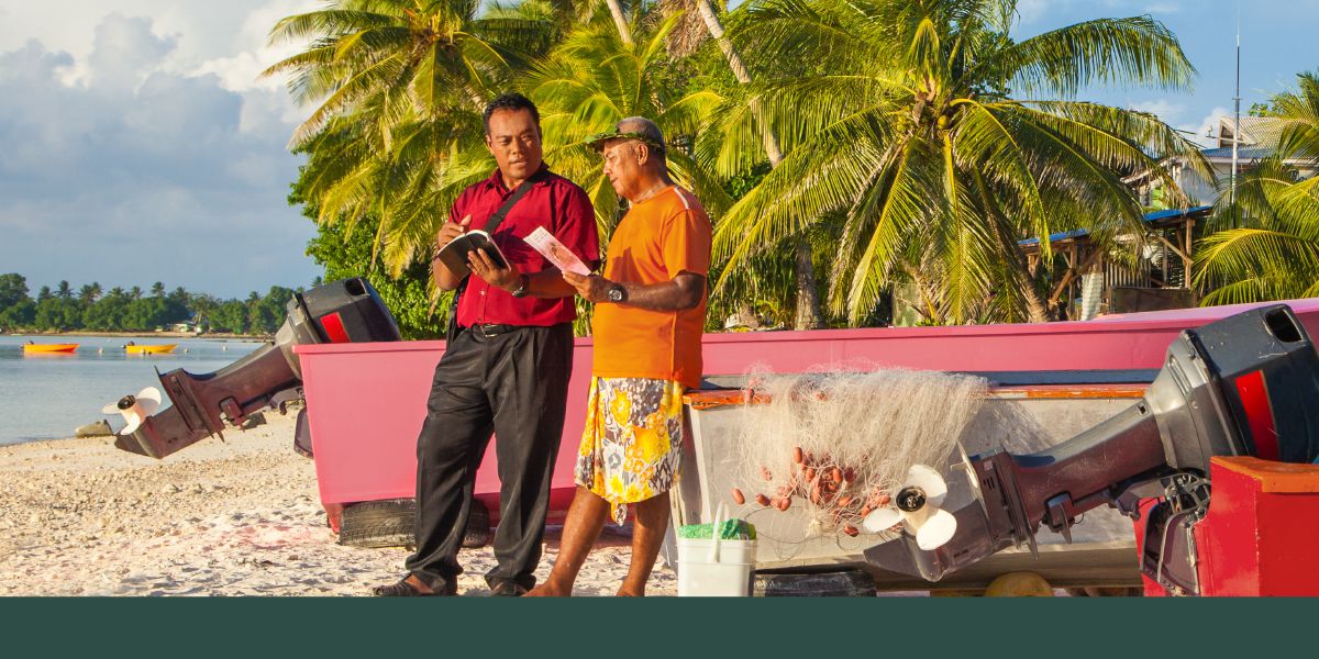 A brother offers the Live Again tract in Tuvalu