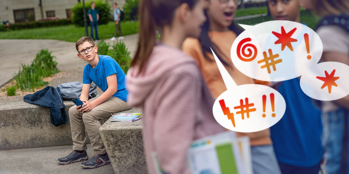 Kluk slyší, jak skupina dospívajících holek mluví sprostě