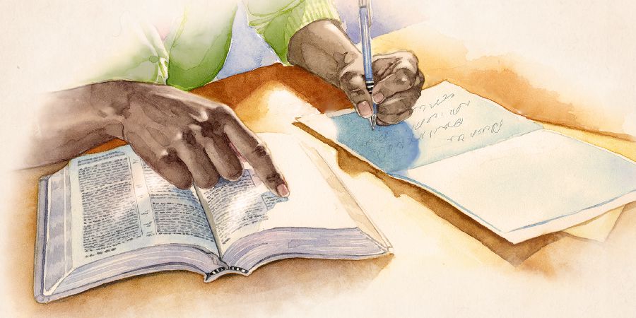Někdo píše kartičku s utešujícím biblickým veršem