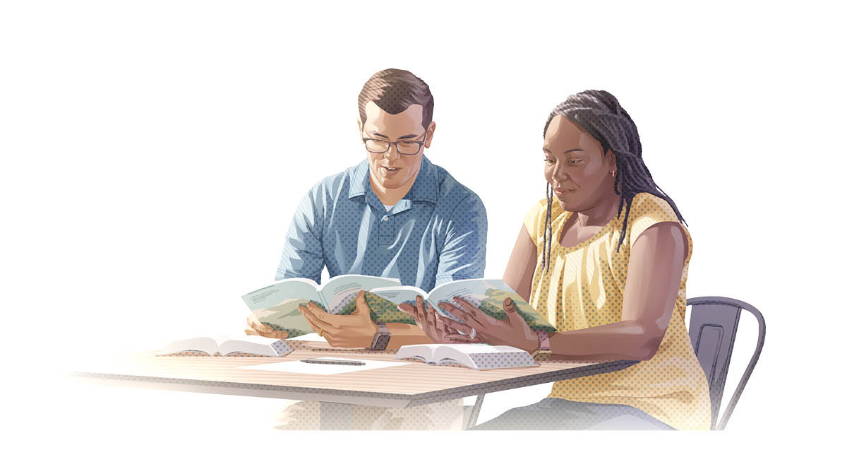 Un matrimonio estudiando la Biblia juntos.