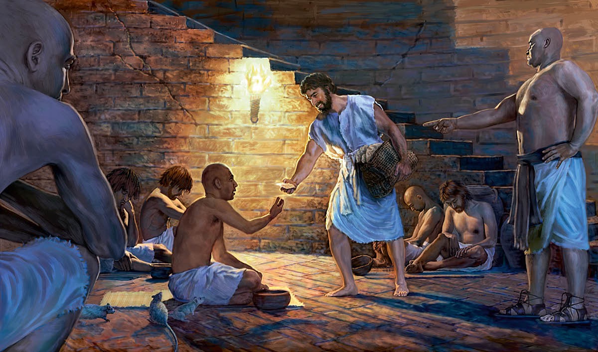 José repartiendo comida a otros prisioneros