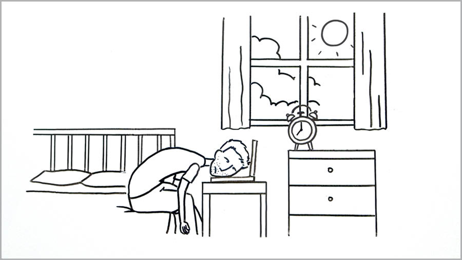 Imagen del video “Si usas las redes, no te enredes”. Un joven pasó toda la noche usando su computadora portátil y se quedó dormido con la cabeza encima de ella.