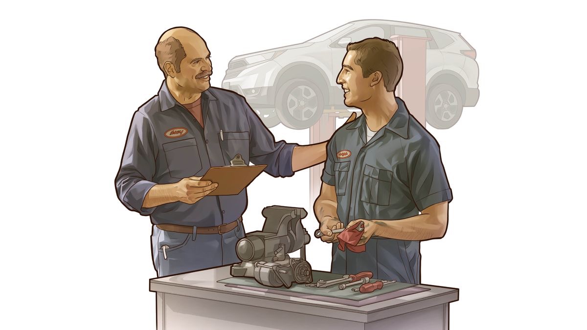 En un taller mecánico, el jefe felicita a un hermano por su trabajo.