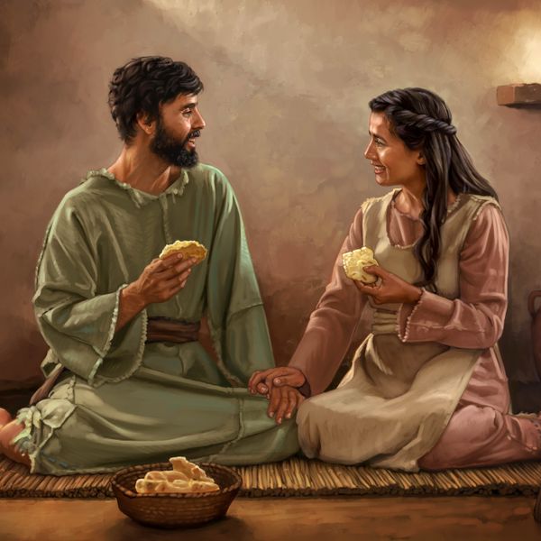 En una casa modesta de tiempos bíblicos, un matrimonio israelita sonriente disfruta de una comida sencilla, un pedazo de pan.