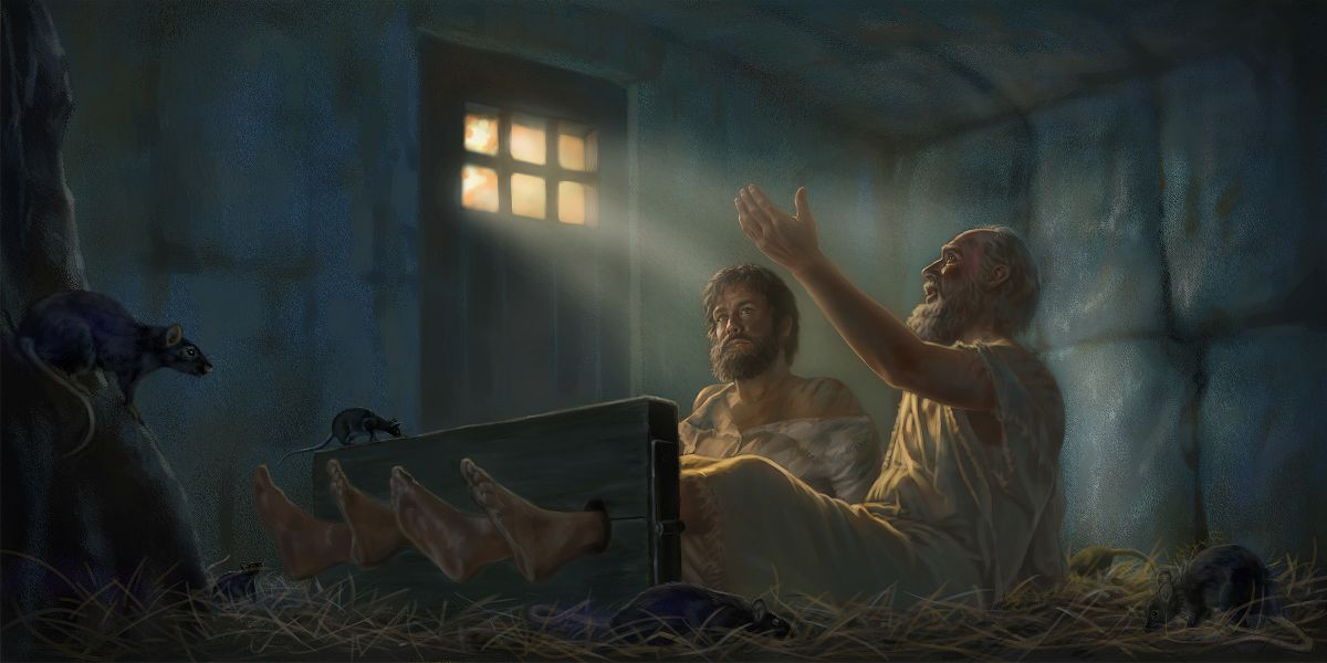 Pablo y Silas en prisión con los pies sujetos en un cepo