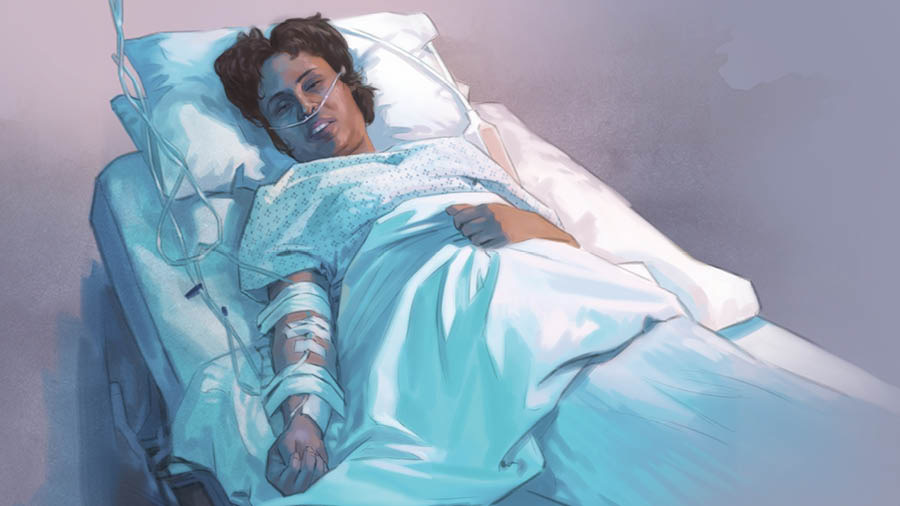 Una mujer en la cama de un hospital con una vía intravenosa en el brazo y un tubo de oxígeno en la nariz.
