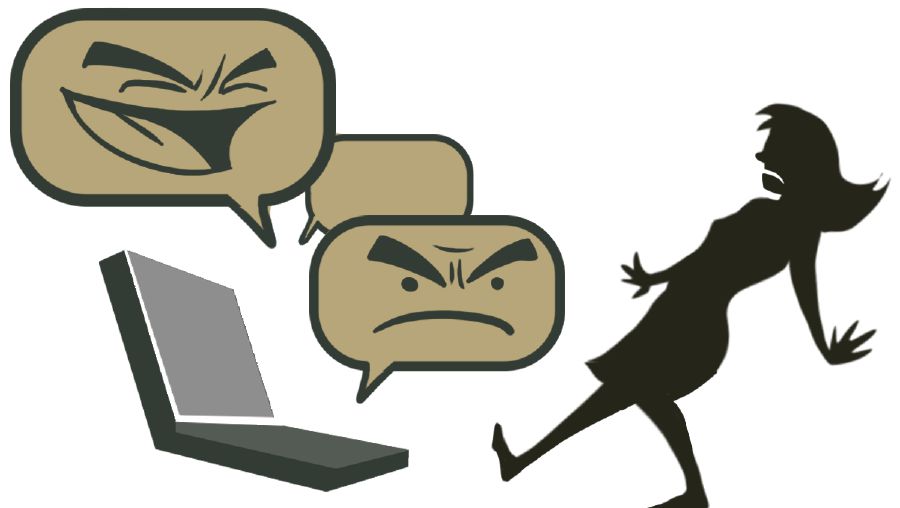 Una joven que es víctima de ciberacoso se aparta de la pantalla de una computadora