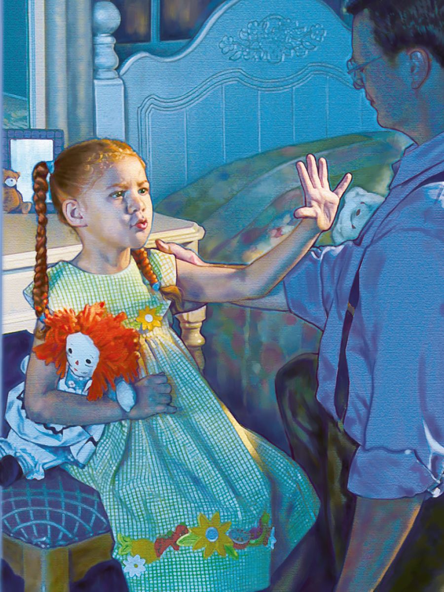 Una niña levanta la mano para que un hombre deje de tocarla