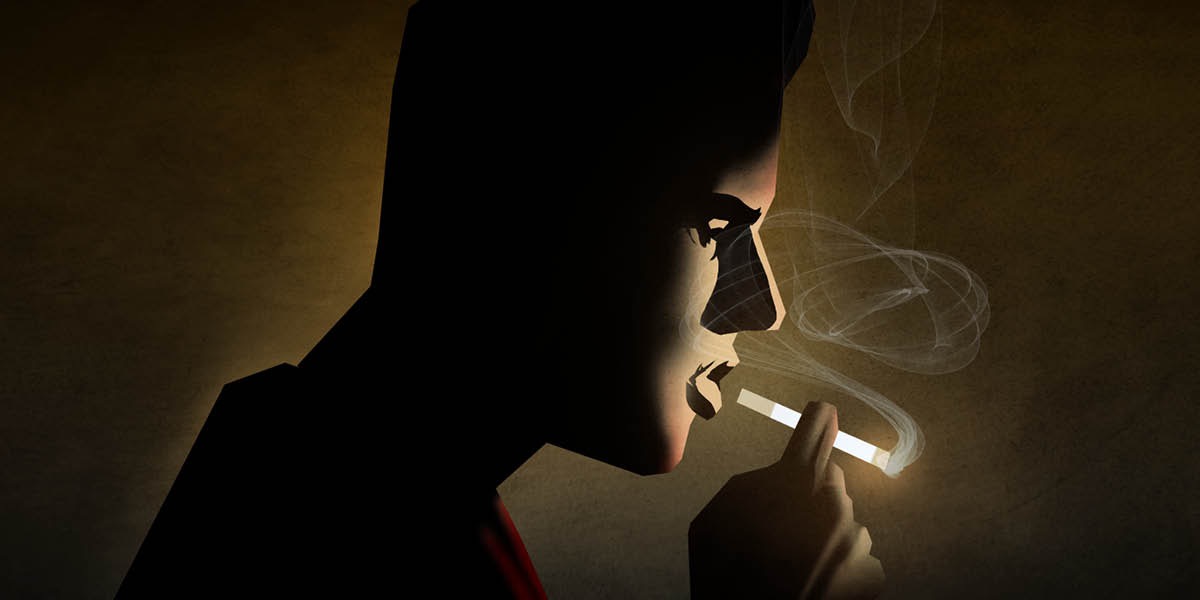 Un hombre fumando