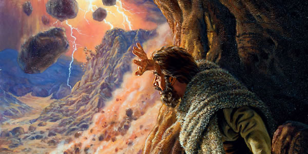 Elijah in a cave watching demonstrations of Jehovah’s power. He sees the effects of a strong wind, an earthquake, and a fire.