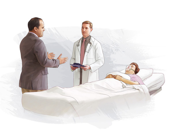 As a woman lays in a hospital bed, her health-care agent talks with the doctor