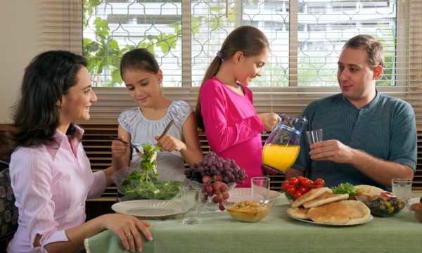 A happy family enjoying a meal together