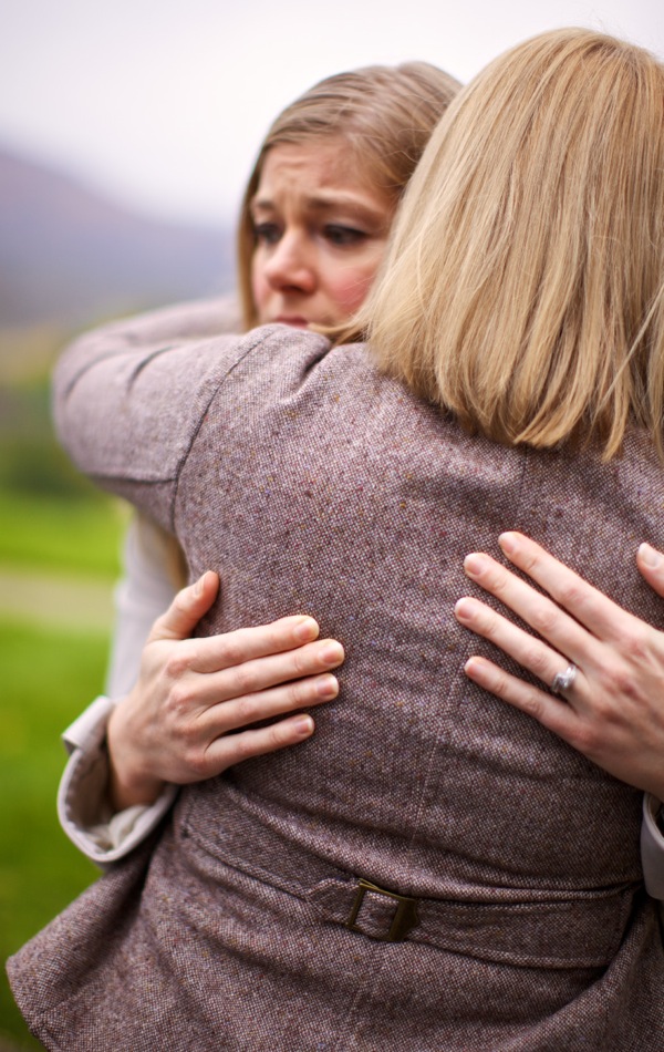 A woman comforting a divorced Christian sister