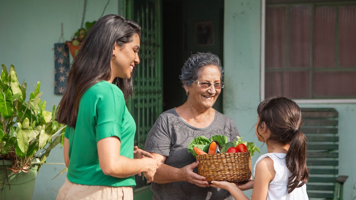 Later, the mother and her young daughter deliver the basket of vegetables to an older sister.