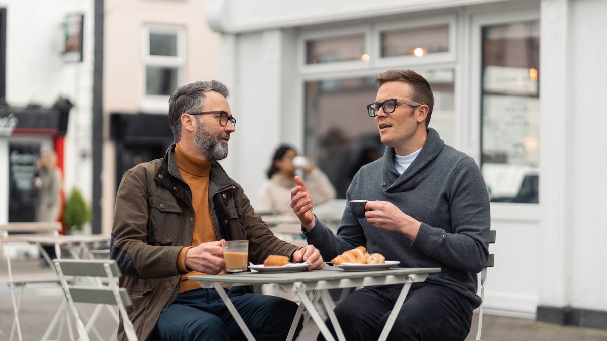 Later that day, the brothers enjoy breakfast at a café. The older brother compassionately listens to the downhearted brother.