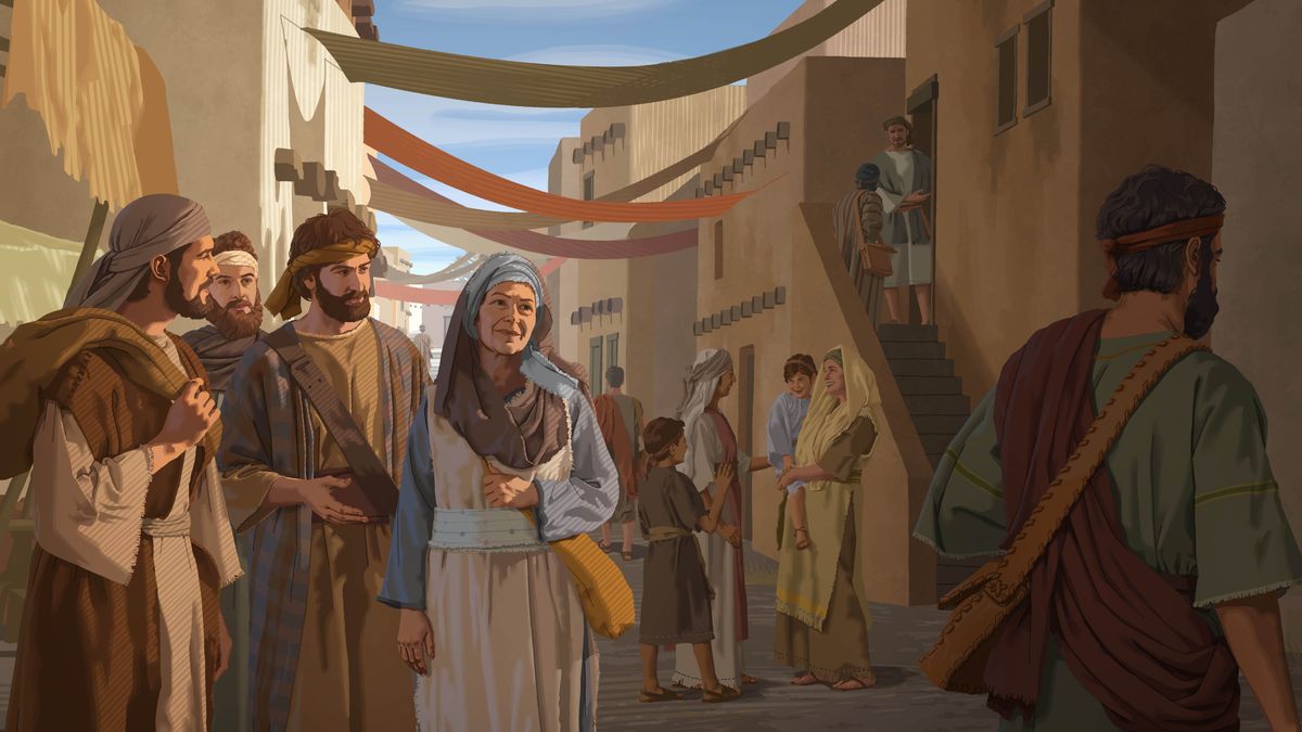 Marie et trois de ses fils marchent dans une rue animée de Jérusalem.
