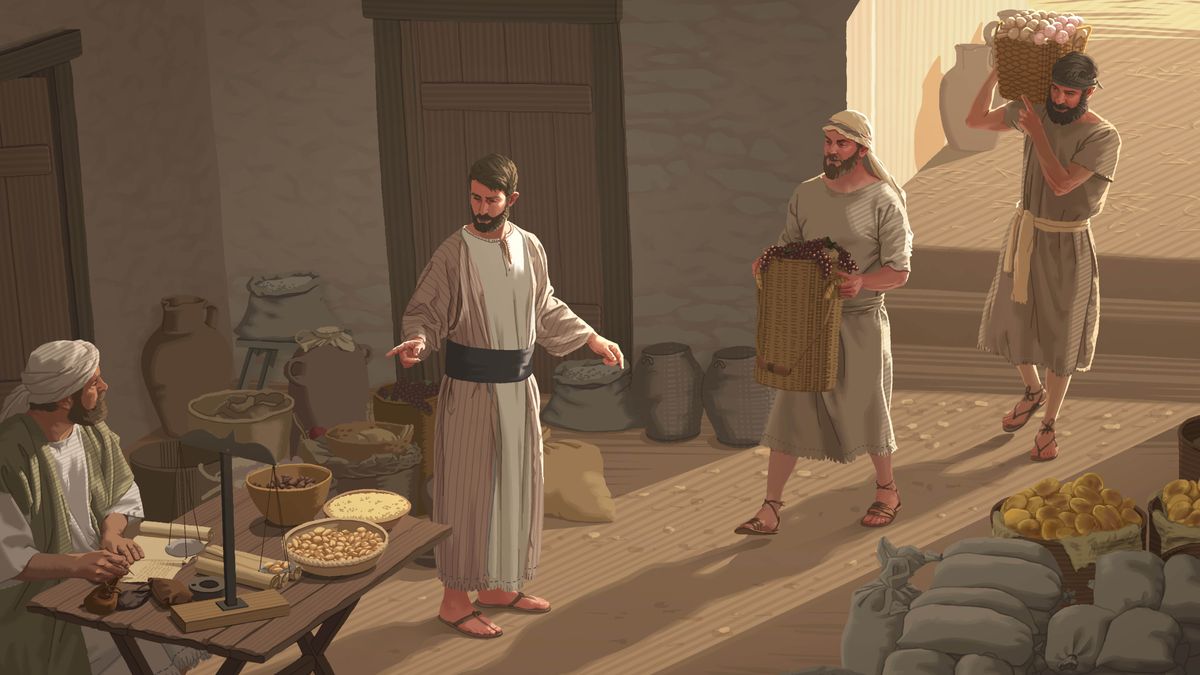 Étienne supervise les activités dans un entrepôt. Deux frères apportent deux grands paniers de nourriture pendant qu’un autre, assis à une table où se trouve une balance, enregistre les livraisons.