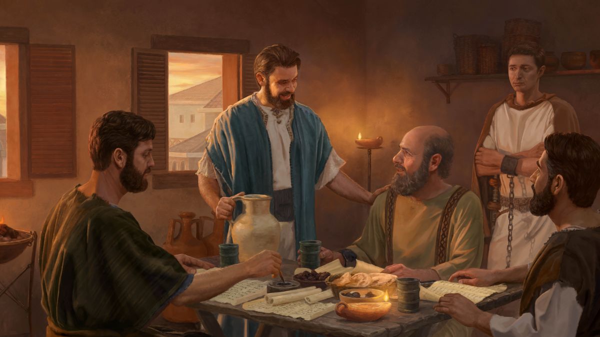 Marc a une conversation amicale avec Paul, qui est assis à une table et enchaîné à un garde. Marc pose la main sur l’épaule de Paul, il lui apporte quelque chose à boire. Deux autres frères écrivent et examinent des rouleaux.