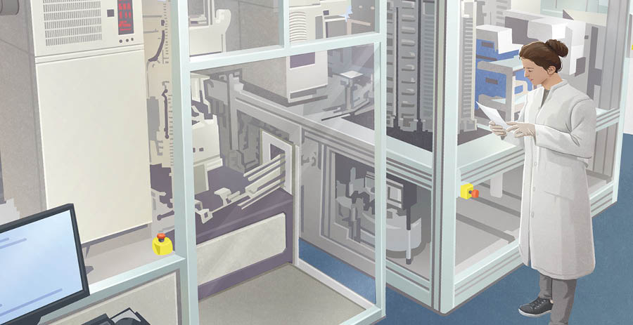 Egy tudós az Adam nevű robot mellett, melyet az élesztősejtek tanulmányozására fejlesztettek ki.