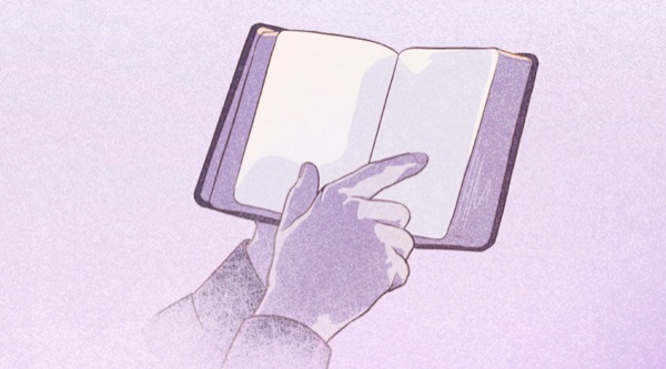 Person pointing at da Bible