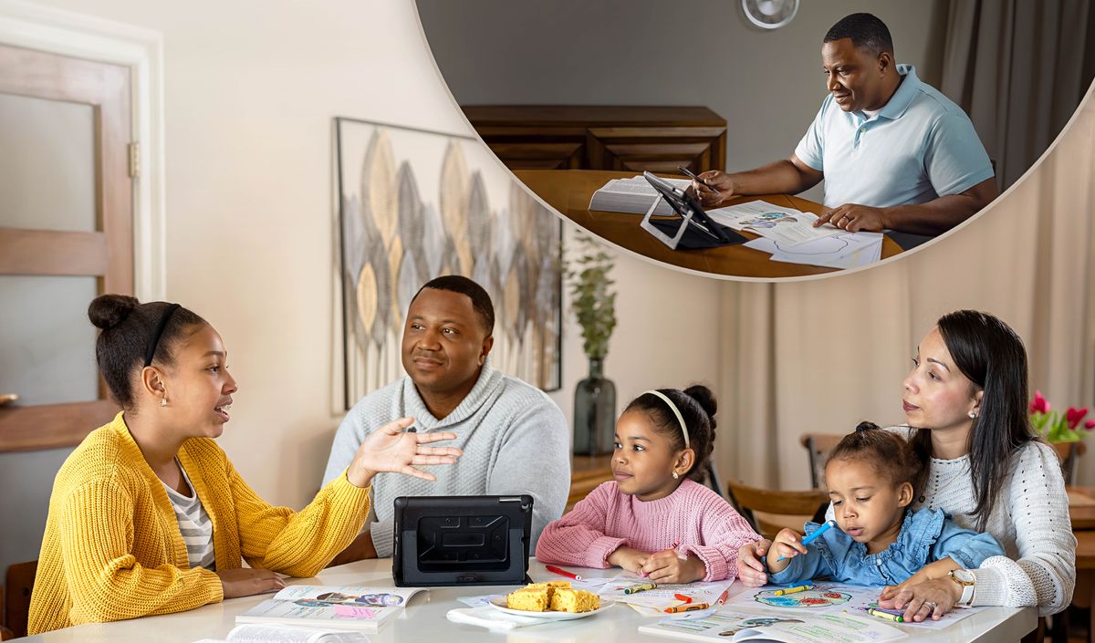 Pichas: 1. One faddah getting ready fo da ohana study. 2. Layta on, da faddah studying wit his wife an three girls.