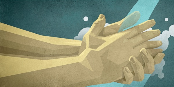 Մի մարդ օճառով լվանում է ձեռքերը