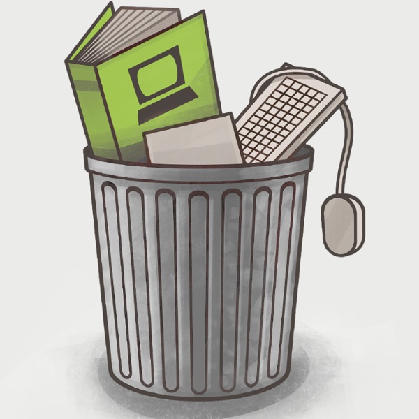 Un bidone che contiene un computer e un manuale datati