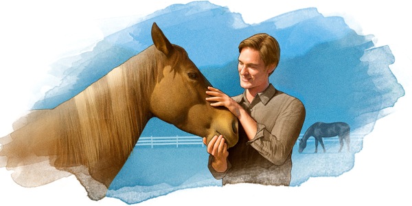 Un uomo accarezza un cavallo