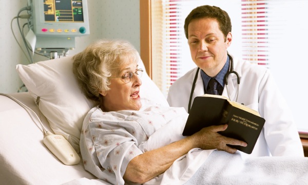 A Christian in a hospital explaining to her doctor what the Bible says about blood