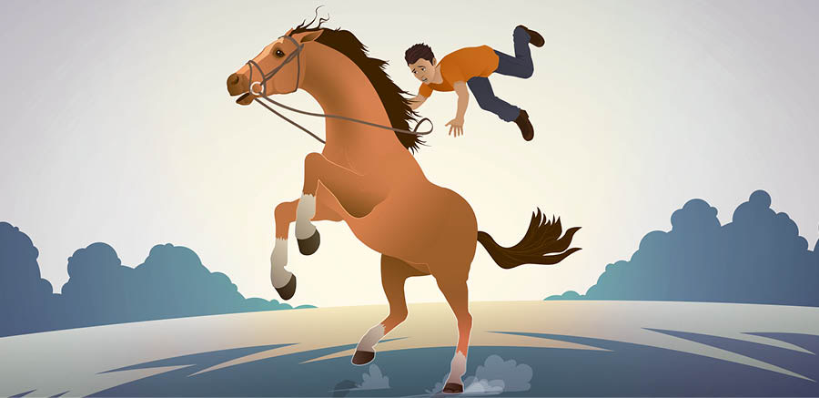 소년이 날뛰는 야생마 위에서 떨어지는 모습.