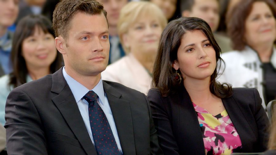 Omwami ne mukyala we nga bali mu lukuŋŋaana lw’Abajulirwa ba Yakuwa