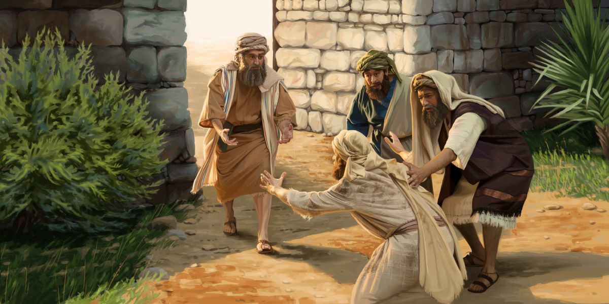 Omusajja asse omuntu mu butanwa ng’atuuse ku mulyango gw’ekibuga eky’okuddukiramu