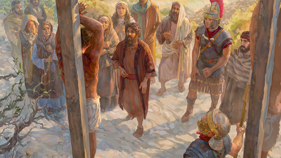 Yesu ng’awanikiddwa ku muti ogw’okubonaabona. Omutume Yokaana, Maliyamu, abasirikale Abaruumi, n’abantu abalala nga bayimiridde kumpi awo.