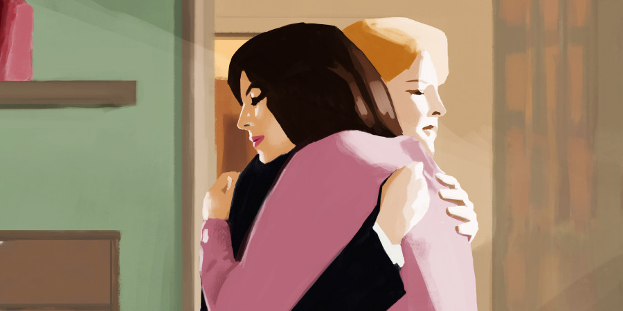 အမျိုးသမီးနှစ်ဦး ပွေ့ဖက်နေ