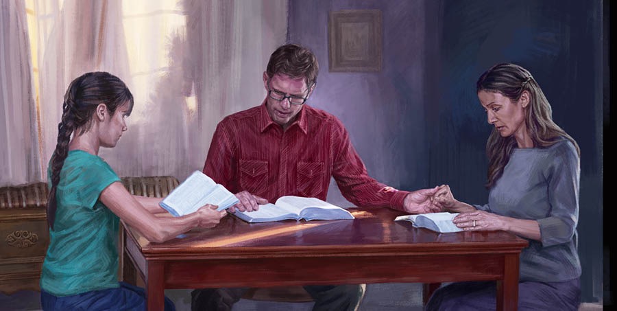 မိသားစုတစ်စု အတူကျမ်းစာဖတ်နေ