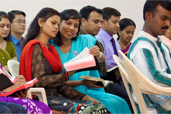 People learning at a Kingdom Hall
