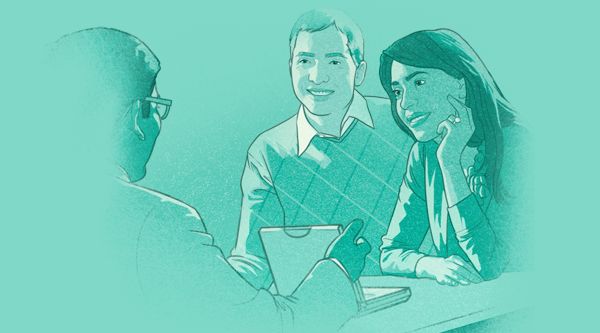 A young couple receive advice from a Christian elder; they read together from the Bible