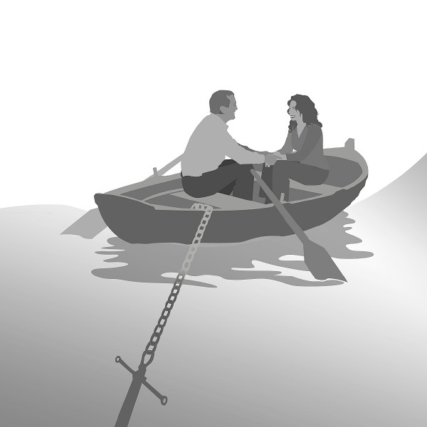 A married couple sitting in a boat anchored to shore