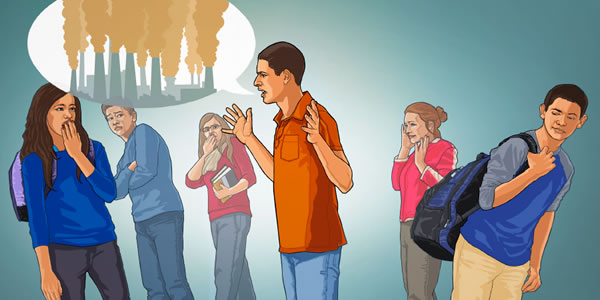 Un grupo de jóvenes alejándose de un chico que está diciendo malas palabras