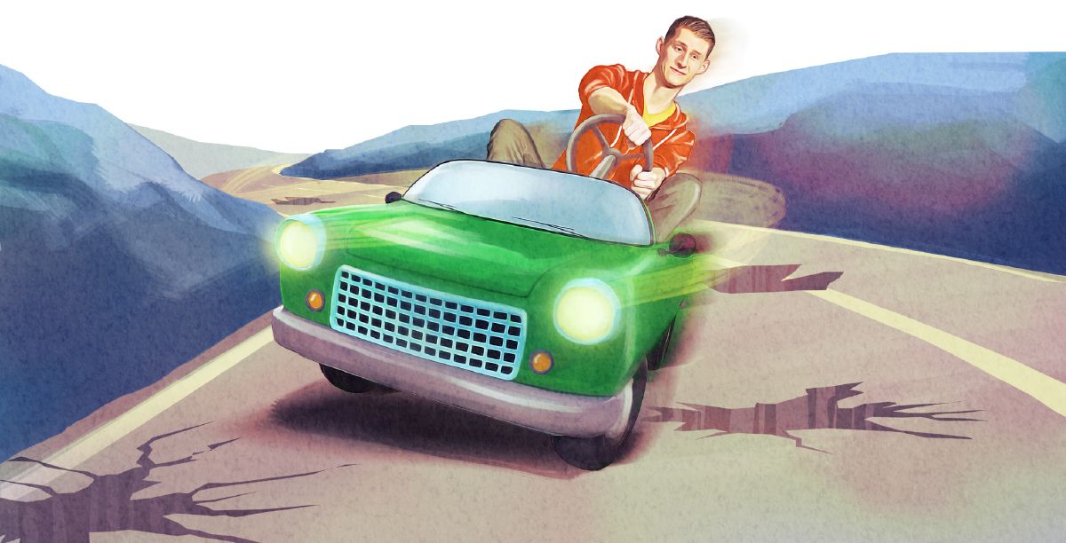 Umusore ariko aragerageza gukwepa ibinogo biri mw’ibarabara