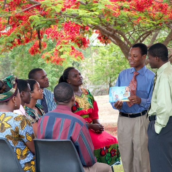 A circuit overseer conducting a meeting for service