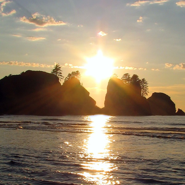 A beautiful sunset over an island and an ocean
