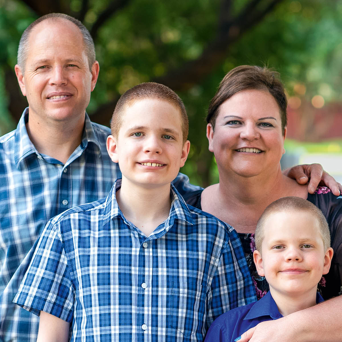 Evan and Samantha with their children, Eli and Adam.