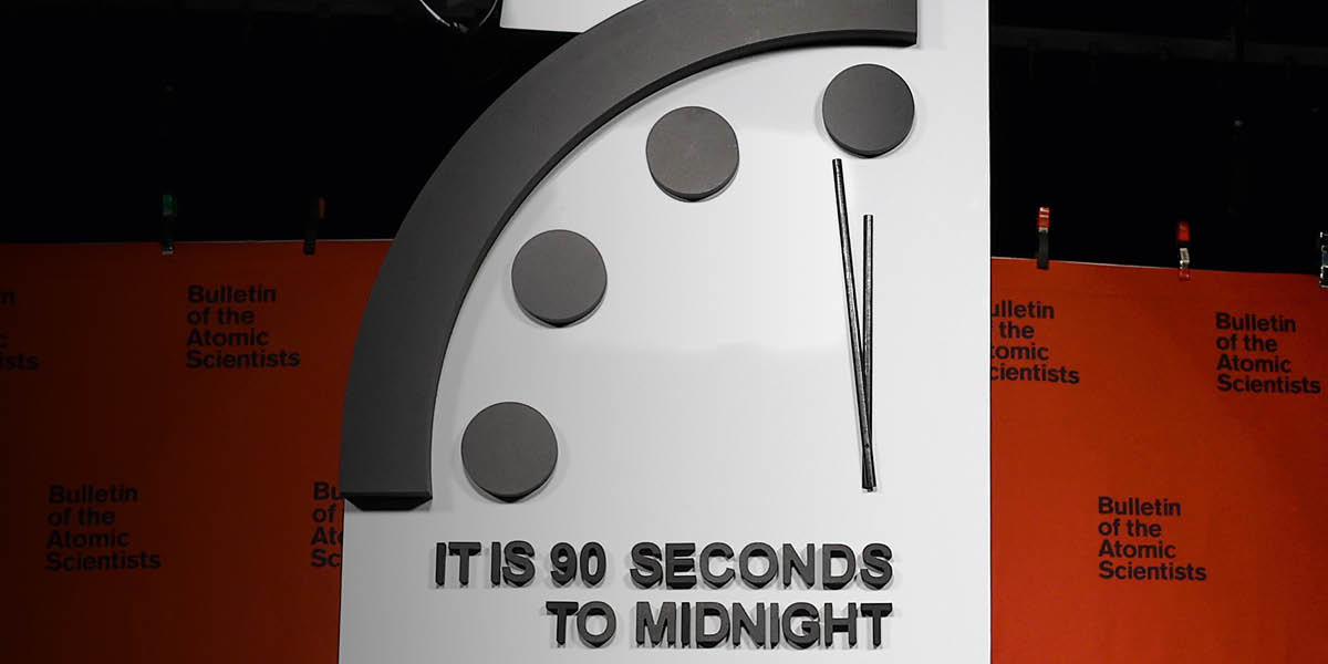 The minute hand of the Doomsday Clock at 90 seconds to midnight.