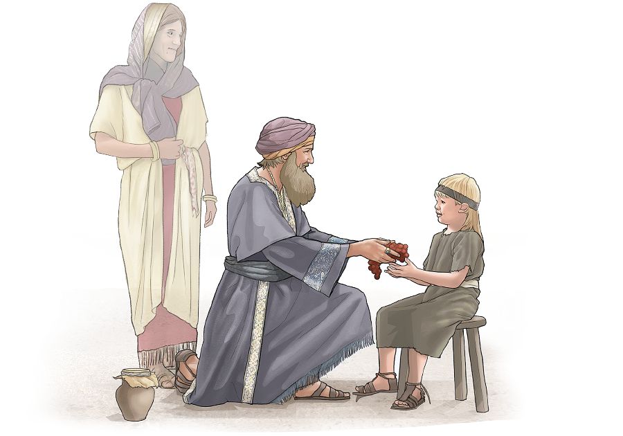 Job gives a little boy some grapes