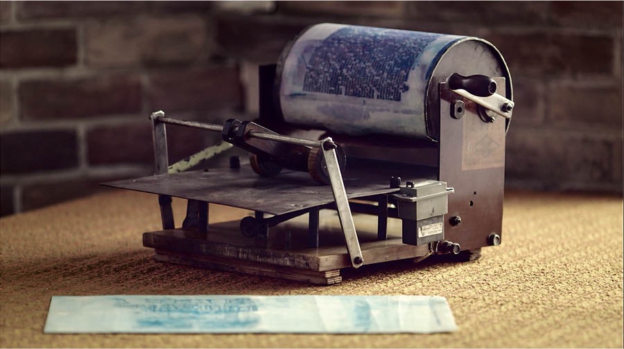 Collage: Scenes from the video ‘Maintaining Unity Under Ban.’ 1. A map showing the countries that were under ban in Eastern Europe. 2. A mimeograph machine. 3. Romanian brothers hugging one another.