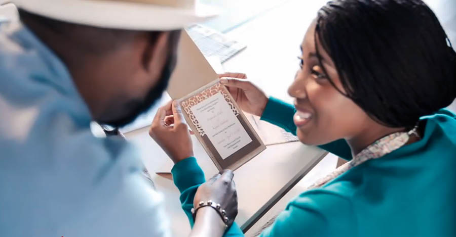 A scene from the video “Maintain a Good Conscience.” Emma and her husband look at a wedding invitation.