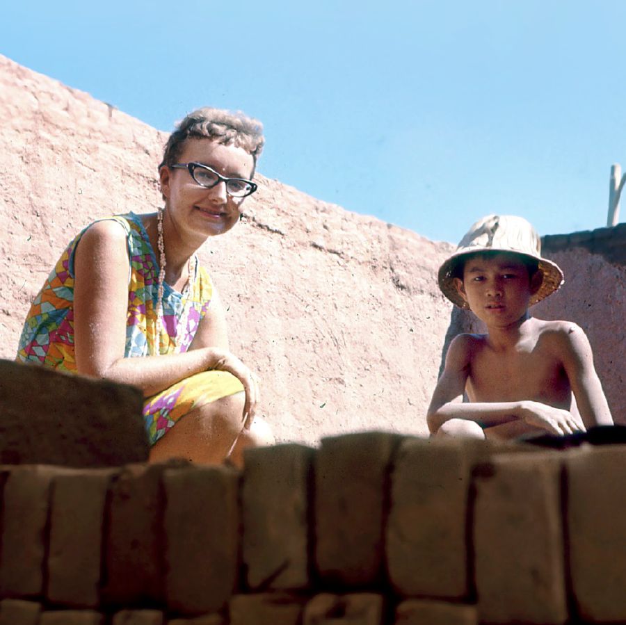 Margaret and a little boy in Laos